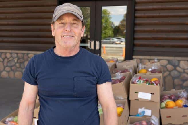 Terry, a longtime volunteer at Colorado Community Church mobile pantry, rarely misses helping out at the twice-monthy distributions.