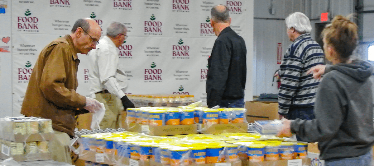 Wyoming food bank volunteers sorting food