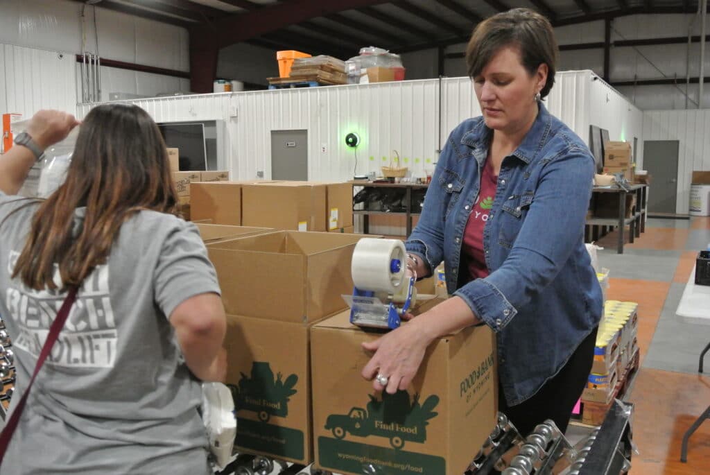 Rachel Bailey working in the food bank distribution center
