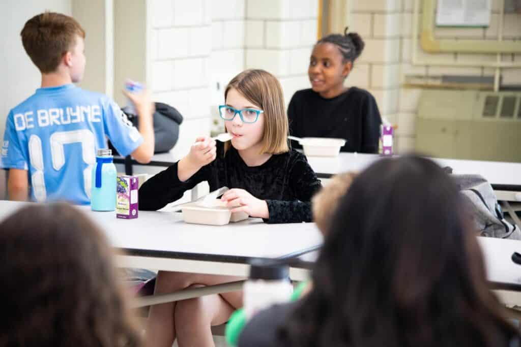 a child eating lunch at school