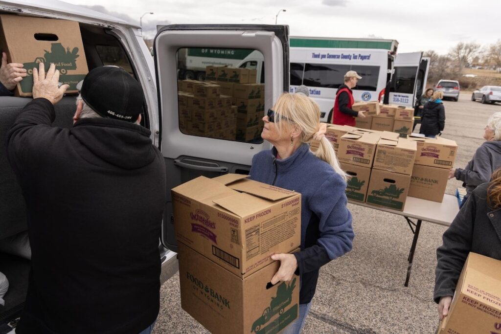 a person driving up to a mobile food pantry in Douglas, WY