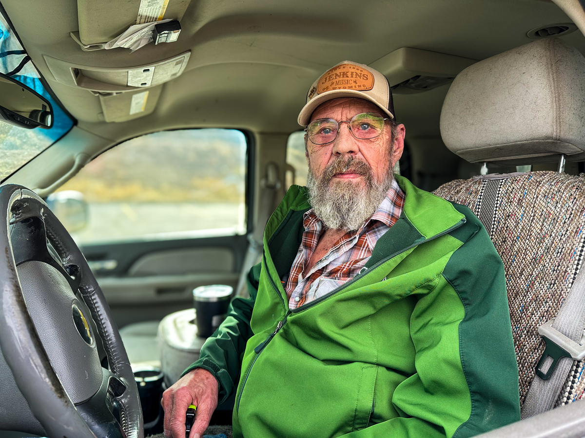 Fred inside their vehicle at a mobile pantry in Wyoming