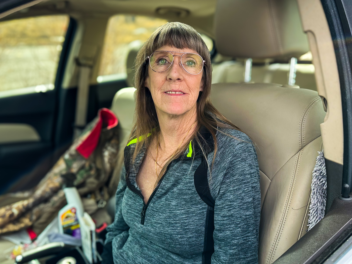 Kimberley in their car at a mobile pantry in Wyoming