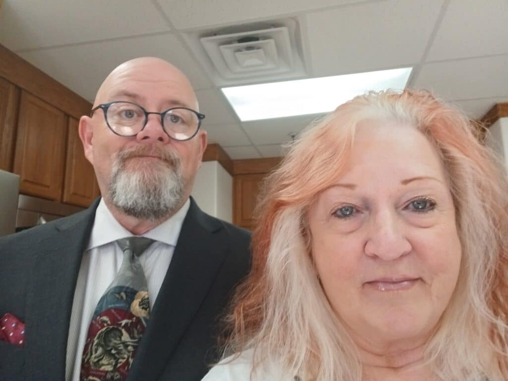 Headshots of Michelle and Russell Bates.